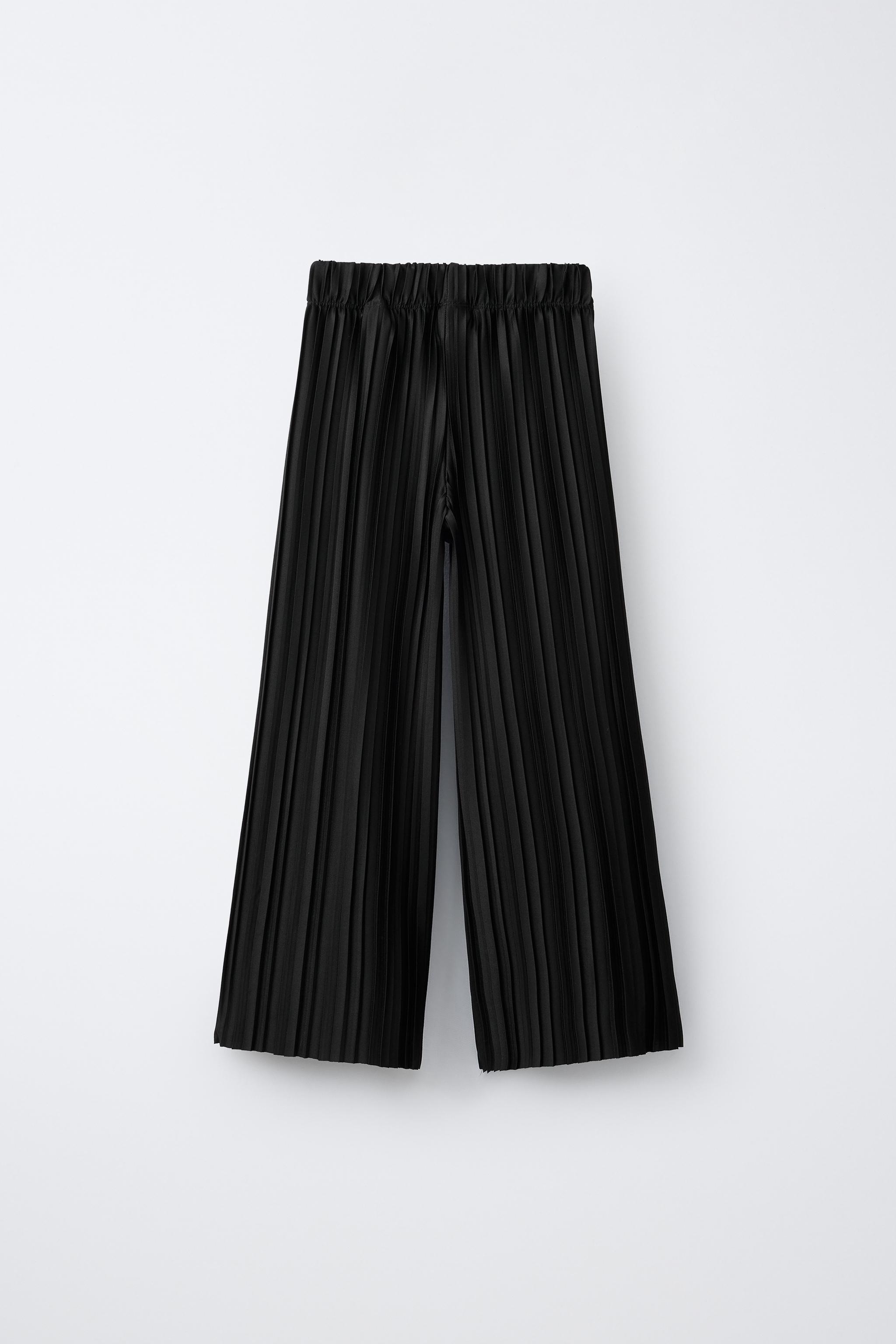 PANTALON PLISSÉ À JAMBES LARGES